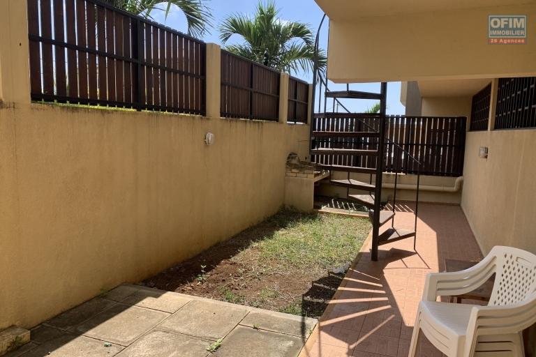 Flic en Flac for rent a 3 bedroom apartment with swimming pool and garden located in a secure residence.