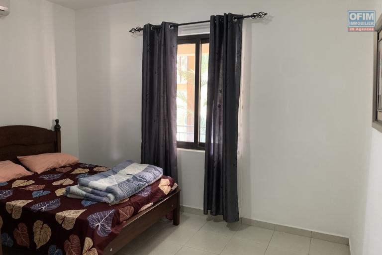 Flic en Flac for rent a 3 bedroom apartment with swimming pool and garden located in a secure residence.