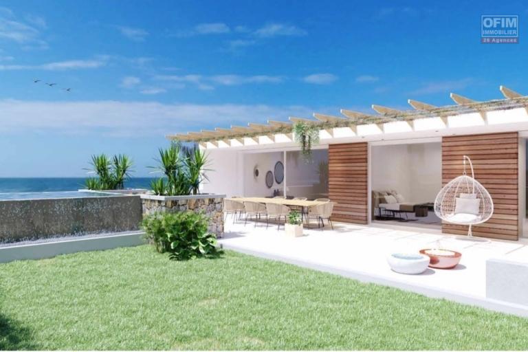 Flic en Flac for sale project of apartments accessible to foreigners with residence permit located in a luxury complex with swimming pool close to shops and the beach.