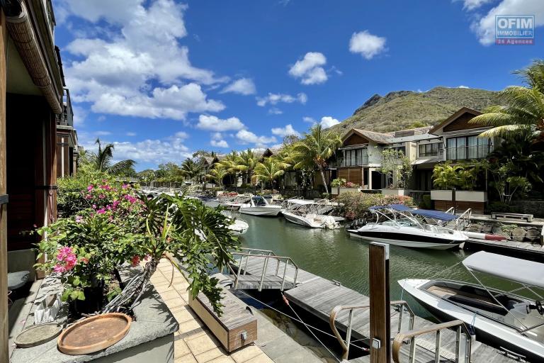 Black River for sale superb 3-bedroom duplex on the waterfront with a beautiful view of the mountains, located in the only residential marina of the island.