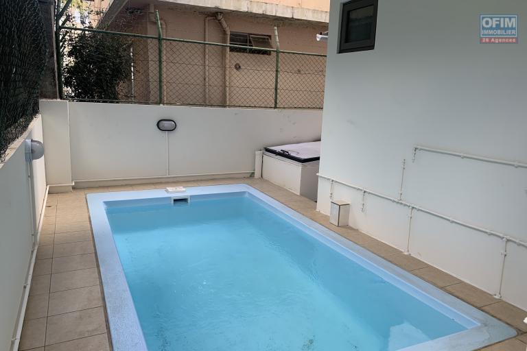 Flic En Flac for rent recent three bedroom apartment with swimming pool close to the beach and shops.