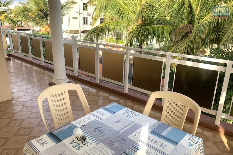 Flic En Flac for rent a four bedroom apartment located at the top of a villa close to the beach in a quiet area.