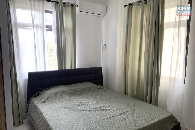 Flic En Flac for rent recent, apartment, three bedrooms close to shops in a quiet area with swimming pool, elevator and gym.