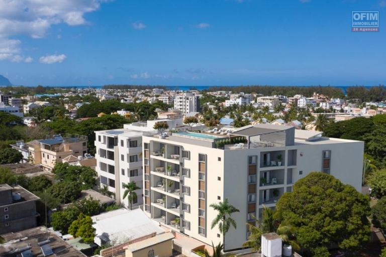 Flic en Flac for sale luxury 2 bedroom apartments with rooftop swimming pool, elevator, rare in Flic en Flac and close to the beach and quiet shops.