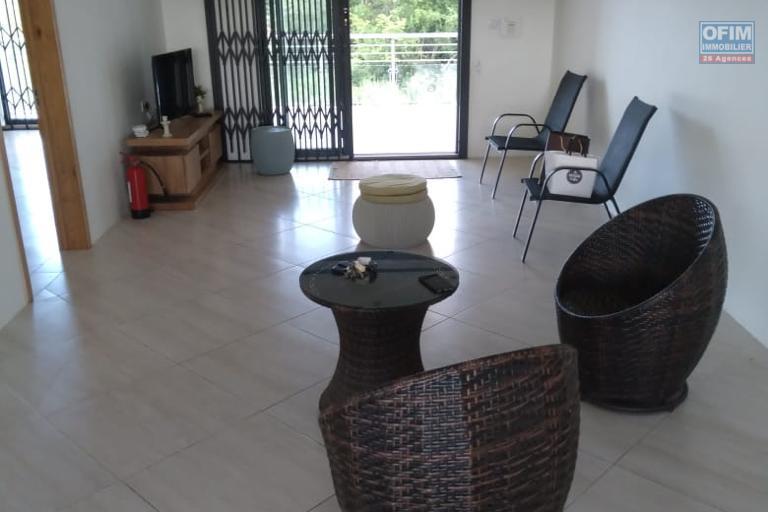 For rent a 3 bedroom apartment on the first floor of a house with a communal swimming pool in Grand Baie.