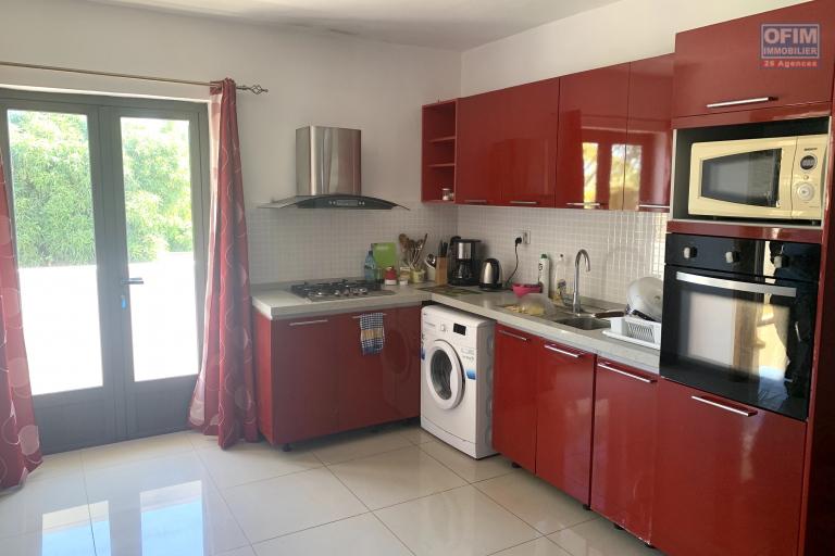 Flic En Flac for sale three bedroom apartment located in a secure residence with swimming pool, gym and elevator in a quiet area.