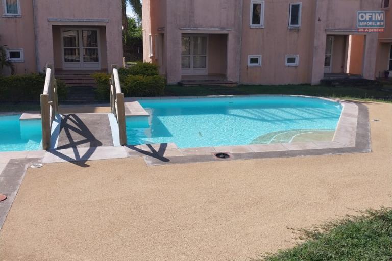 For sale a 2 bedroom duplex in a secure residence with shared swimming pool and tree-lined courtyard in Grand Gaube.