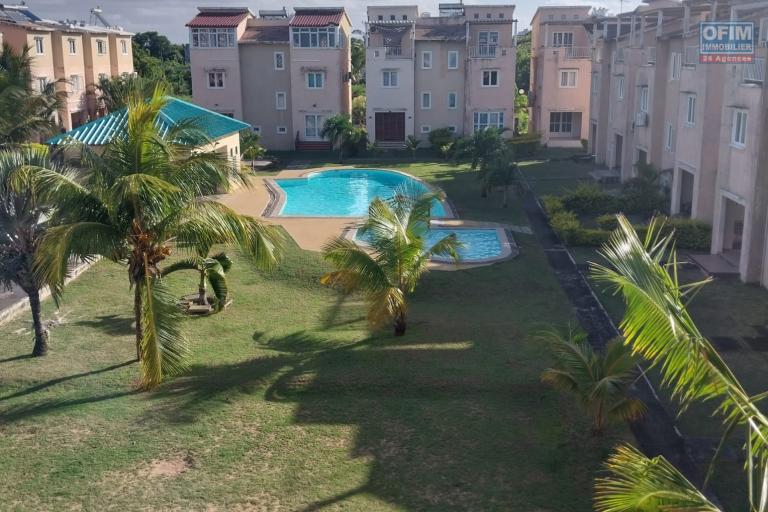 For sale a beautiful triplex in very good condition in a peaceful and secure residence with shared swimming pool in Grand Gaube.