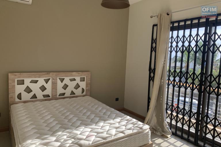 Flic en Flac for rent beautiful new 3 bedroom duplex villa with swimming pool fully furnished and tastefully decorated in a quiet area 5 minutes from the beach and shops.