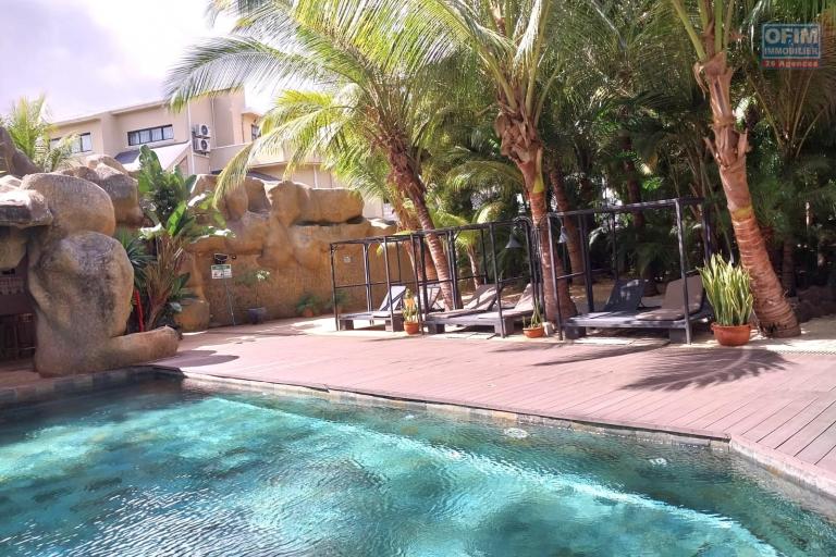 Flic en Flac for rent huge 3 bedroom apartment located in a prestigious secure residence with shared swimming pool in a quiet area and 5 minutes walk from the beach and shops.