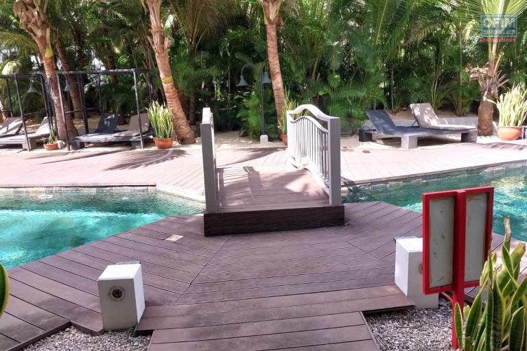 Flic en Flac for rent huge 3 bedroom apartment located in a prestigious secure residence with shared swimming pool in a quiet area and 5 minutes walk from the beach and shops.