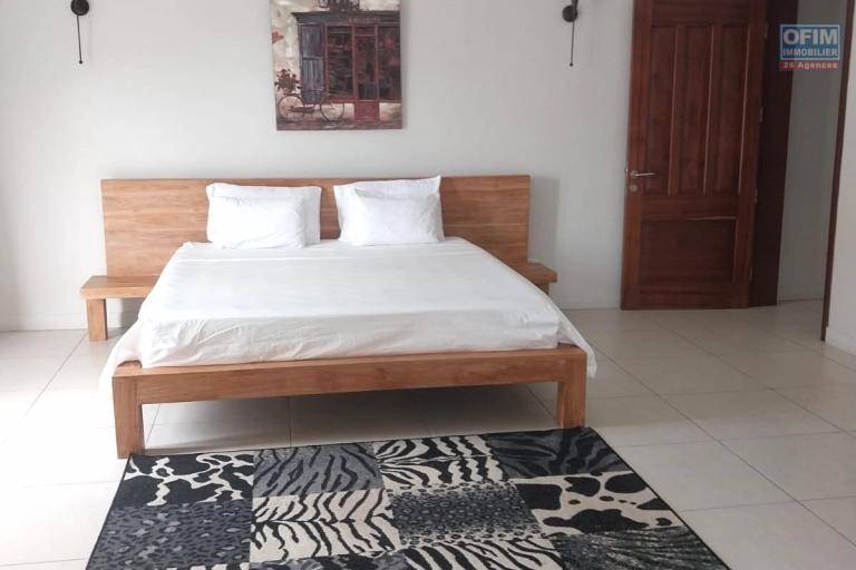 Flic en Flac for rent huge 3 bedroom apartment located in a prestigious secure residence with shared swimming pool in a quiet area and 5 minutes walk from the beach and shops.