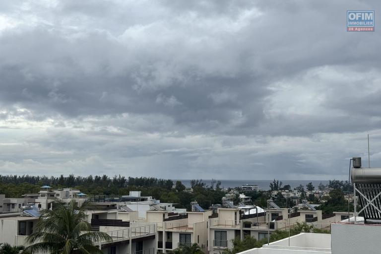 Flic en Flac for rent 2 bedroom apartment with open view, shared swimming pool and 1 parking space.