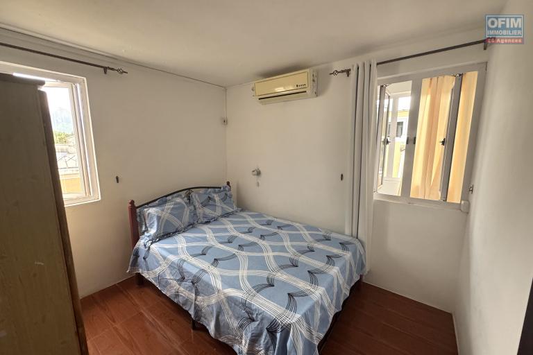 Flic en Flac for rent 2 bedroom apartment with open view, shared swimming pool and 1 parking space.