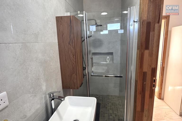 Flic en Flac for rent recent 3 bedroom apartment with shared swimming pool located on the second floor in a quiet residential area.