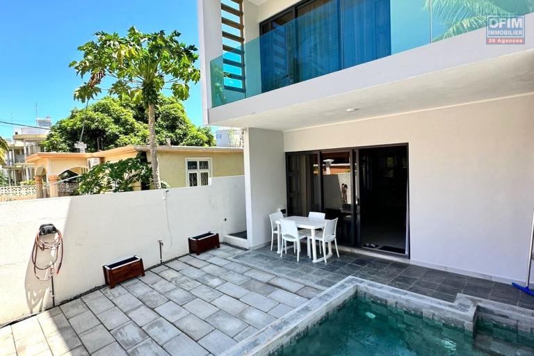 Flic En Flac for sale 4 bedroom triplex ideally located in a quiet area with swimming pool 3 minutes walk from the beach