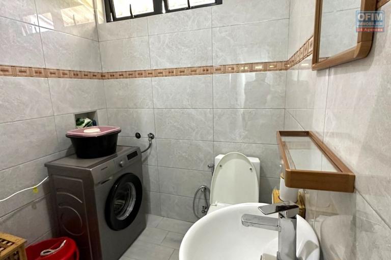 Flic En Flac for sale 4 bedroom triplex ideally located in a quiet area with swimming pool 3 minutes walk from the beach