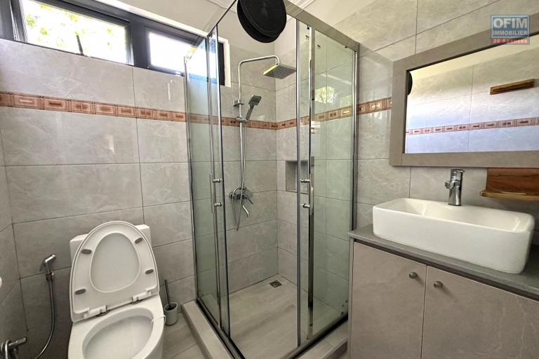 Flic En Flac for sale 4 bedroom triplex ideally located in a quiet area with swimming pool 3 minutes walk from the beach