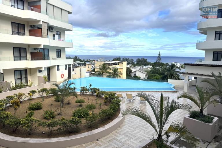 Flic en Flac for rent recent 2 bedroom apartment with swimming pool, gym, elevator and covered parking located in a secure residence.
