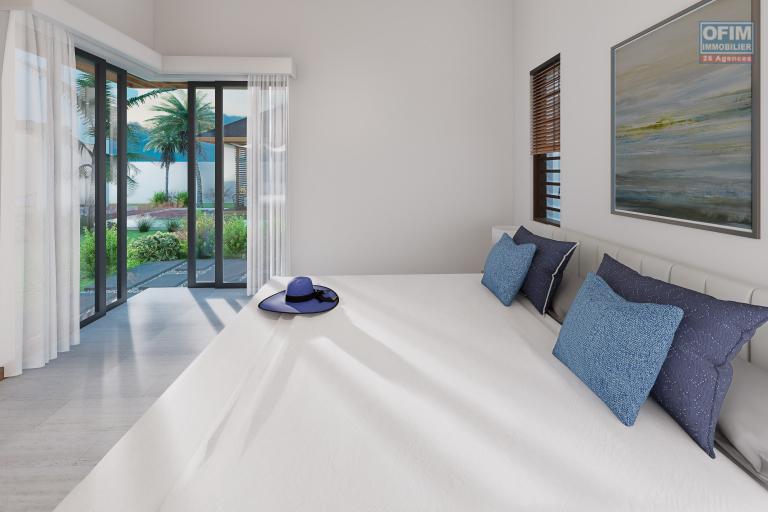 Sale House / Villa TAMARIN - RIVIERE NOIRE - MORNE – photo 7 of 10 – Bright bedroom