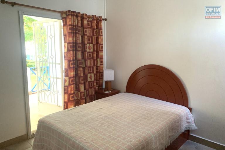 Flic En Flac, three-bedroom duplex for rent with swimming pool, located in a quiet, secure complex, close to the beach and shops.