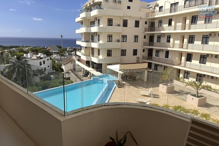 Flic en Flac – For rent, beautiful 1 bedroom apartment located in a luxury residence with swimming pool, gym and covered parking.