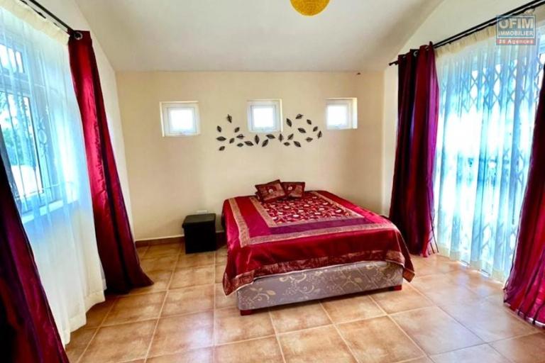 Charming three-bedroom villa with an office and swimming pool in a quiet location in Flic En Flac for rent.