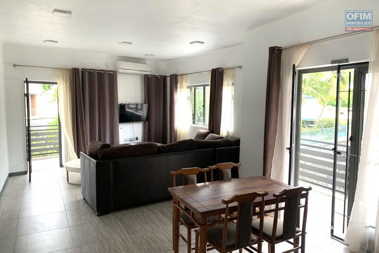 Flic En Flac apartment for rent with three en-suite air-conditioned rooms, communal swimming pool and parking.