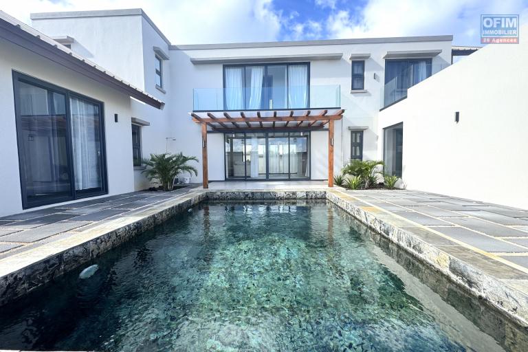  Flic en Flac for sale beautiful 4 bedroom villa delivery June 2025 with ocean view, swimming pool and garage located in a residential and secure area.