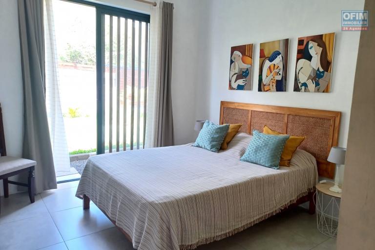 Sale House / Villa TAMARIN - RIVIERE NOIRE - MORNE – photo 13 of 16 – Bright bedroom