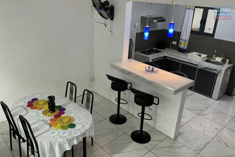 Sale House / Villa GRAND BAIE - PEREYBERE - POINTE AUX CANONNIERS – photo 2 of 11 – Fitted open-plan kitchen