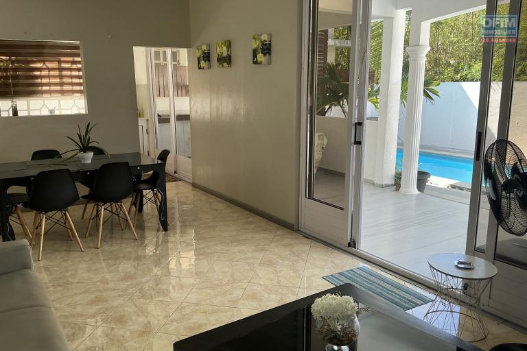 For sale in Mont Choisy, 300m from the beach. 4-bedroom villa + rooftop terrace. Reserved for local market - rare investment opportunity.