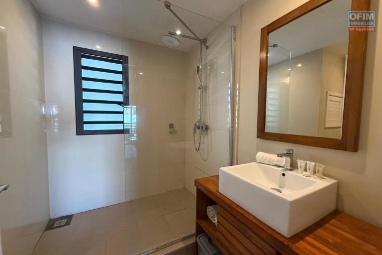 Located in the Be Cosy residence in Trou aux Biches, this fully furnished 50m2 apartment on the first floor offers an ideal living environment just steps from the beach.