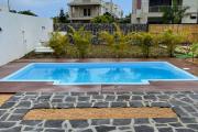 For sale new villa in Pointe aux Piments close to shops, supermarket, bus lines and the beach.