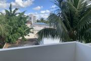 Flic En Flac for rent recent three bedroom apartment with swimming pool close to the beach and shops.