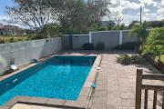 For rent 3 bedroom apartment on the first floor of a house with swimming pool in Grand Baie.