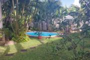 For sale large and comfortable residence of 350 m2 with private swimming pool and beautiful wooded courtyard in Trou aux Biches.