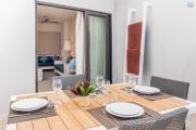 Trou aux Biches: Prestigious residence - one bedroom apartment with two terraces for sale close to the beach.