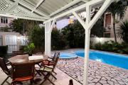 For sale a fenced 3 bedroom villa with salt pool and garden in Mont Choisy