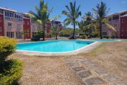 For sale a 3 bedroom bungalow in a secure and maintained residence with a communal swimming pool in Grand Gaube.
