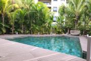 Flic en Flac for rent huge 3 bedroom apartment located in a prestigious secure residence with shared swimming pool in a quiet area and 5 minutes walk from the beach and shops.