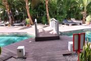 Flic en Flac for rent huge 3 bedroom apartment located in a prestigious secure residence with shared swimming pool in a quiet area and 5 minutes walk from the beach and shops.