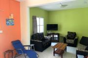 Flic en Flac for rent 3 bedroom duplex villa located in a secure residence facing the ocean and in a magnificent park.