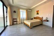 Flic En Flac for sale 4 bedroom triplex ideally located in a quiet area with swimming pool 3 minutes walk from the beach