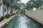 Flic en Flac for sale, accessible to foreigners, luxury 2-bedroom apartment with swimming pool.