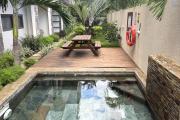 Flic en Flac for sale, accessible to foreigners, luxury 2-bedroom apartment with swimming pool.