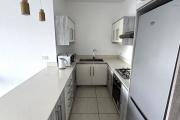 Flic en Flac for sale, accessible to foreigners, luxury 2-bedroom apartment with swimming pool.