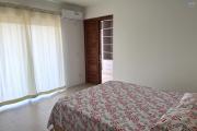 Flic en Flac for rent 3 bedroom apartment with 2 swimming pools located in a splendid secure residence 500m from the beach and shops.