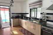 Flic en Flac for rent recent 4 bedroom duplex villa with swimming pool located in a quiet residential area.