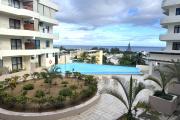 Flic en Flac for rent recent 2 bedroom apartment with swimming pool, gym, elevator and covered parking located in a secure residence.